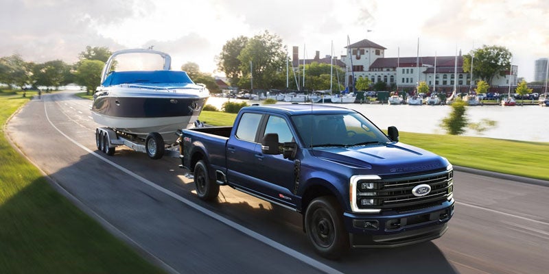 2026 Ford F-250 Super Duty towing a boat trailer